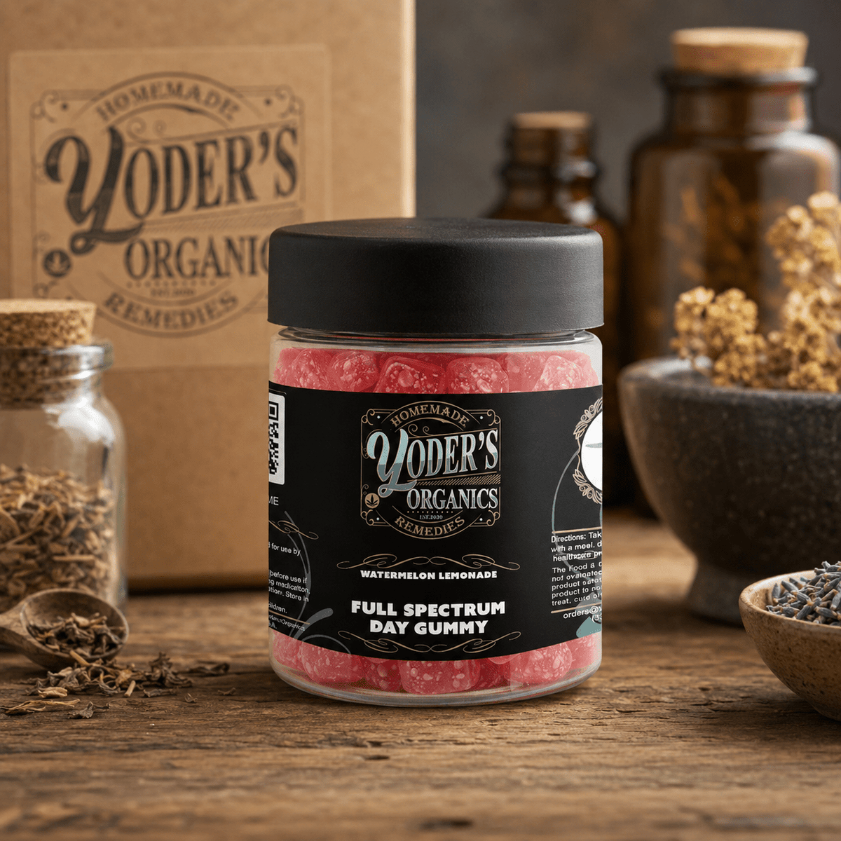 Full spectrum CBD day gummies jar with a Yoder's Organics box and dried herbs